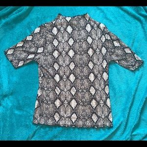 Tight fitting snake print top